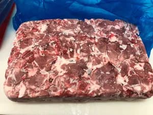 Frozen pork trimming 90/10 temple+collar together